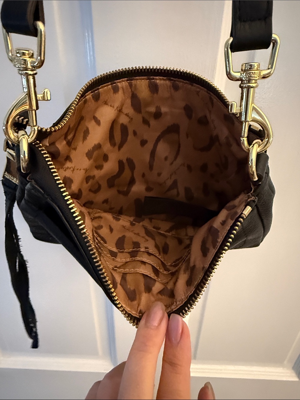 Aimee Kestenberg Black Leather Crossbody with Gold Hardware and Tassel Accent - Picture 4 of 4